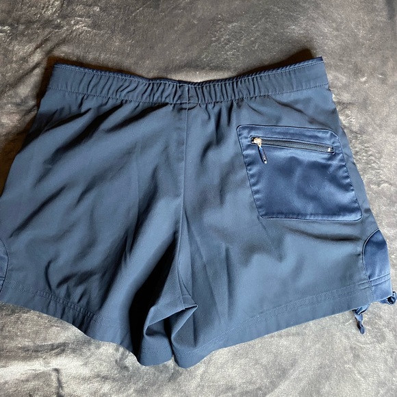 Unique Nike women’s short with ties on the sides and fun zippers! - Picture 2 of 8